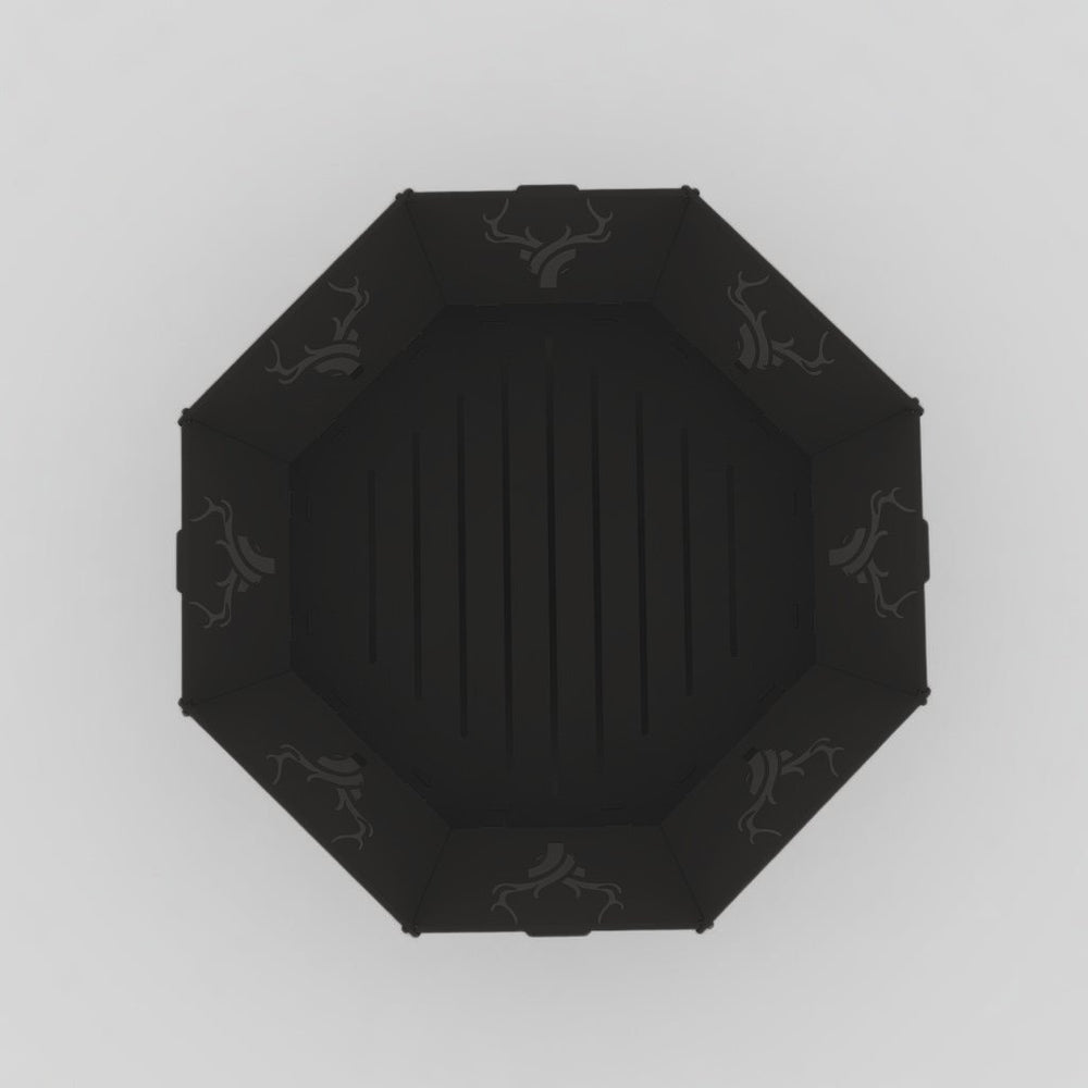 Large octagon black powder-coated fire pit, top-down studio view