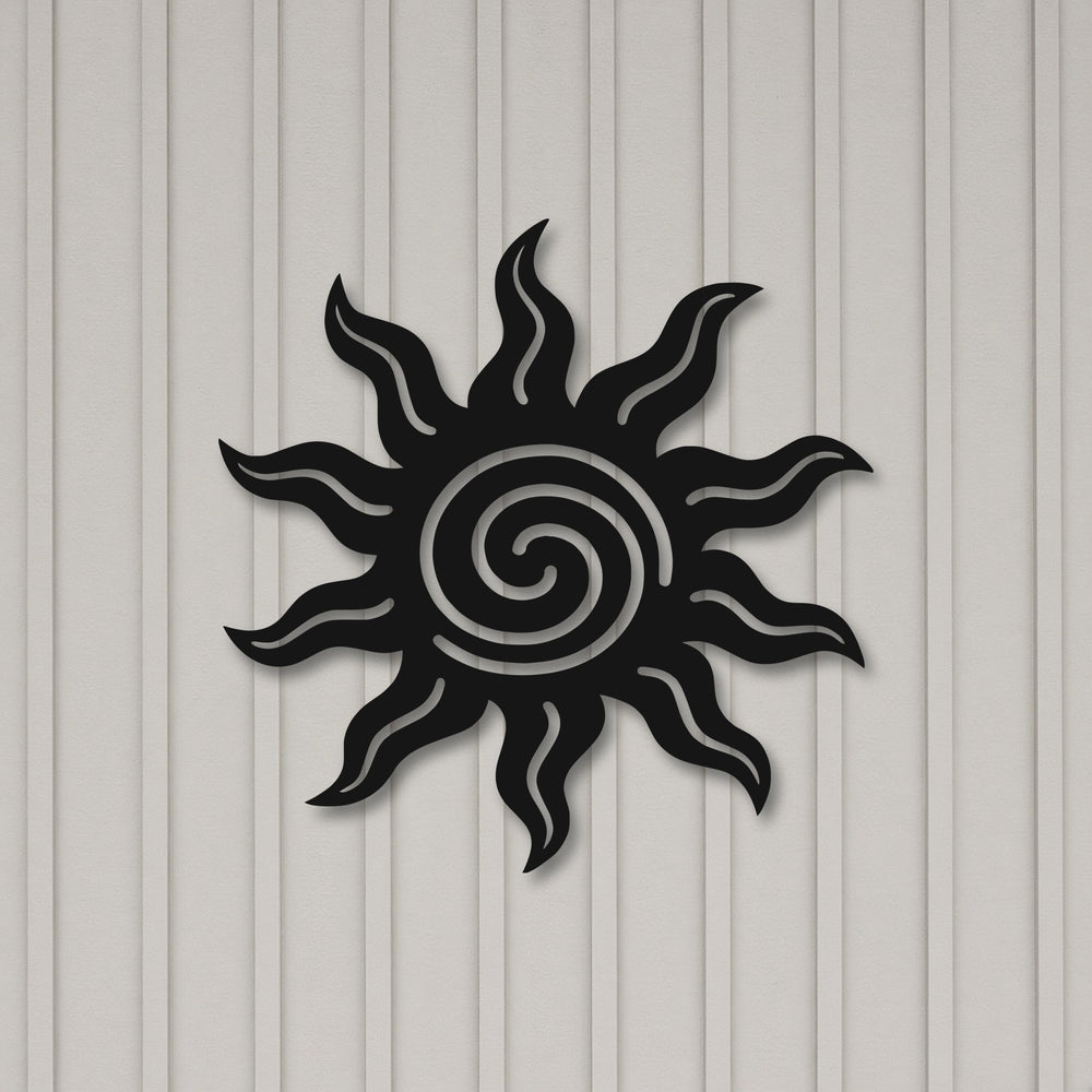 Mockup of the tribal sun metal wall art on a grey board and batten wall