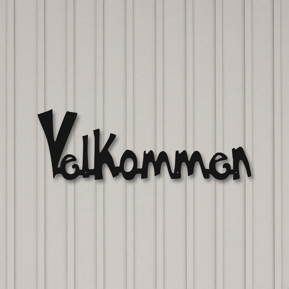 Mockup of the Velkommen metal welcome sign on a grey board and batten wall